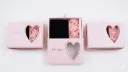 A box of pink roses
